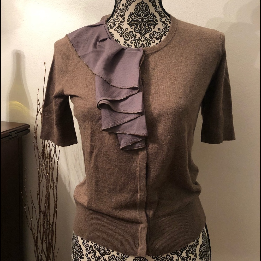 Women’s short sleeve cardigan.